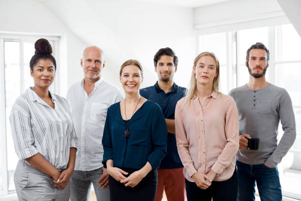 istock Portrait of multi-ethnic colleagues in office 1173164526