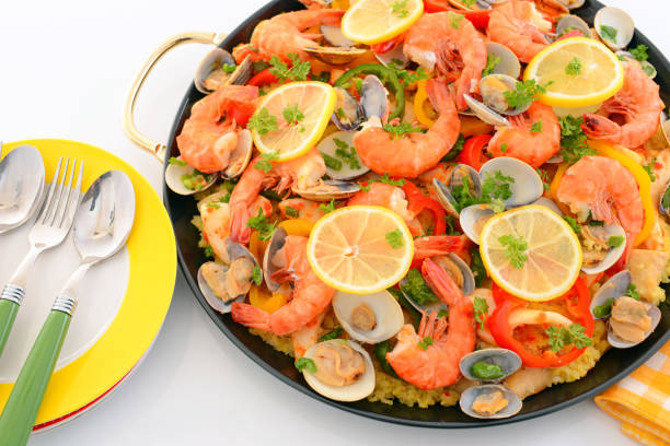 istock Delicious paella in pan 1173164827