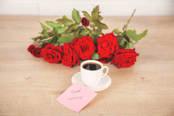 istock good morning text on card with coffee and roses 1173166421