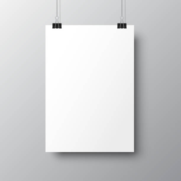 istock Blank posters hanging with shadows. Hanging white paper on binders. A4 paper page, mockup, sheet on wall - vector 1173167433
