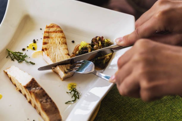 istock Cutting turkey fillet with broccoli in sharp sauce, major plan 1173167662