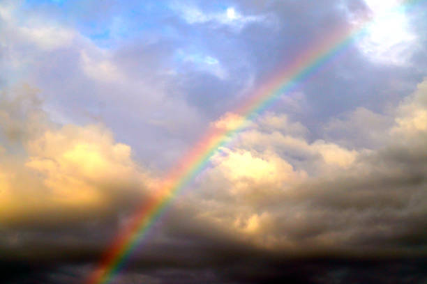 istock Beautiful rainbow on a cloudy sky after rain. 1173169633
