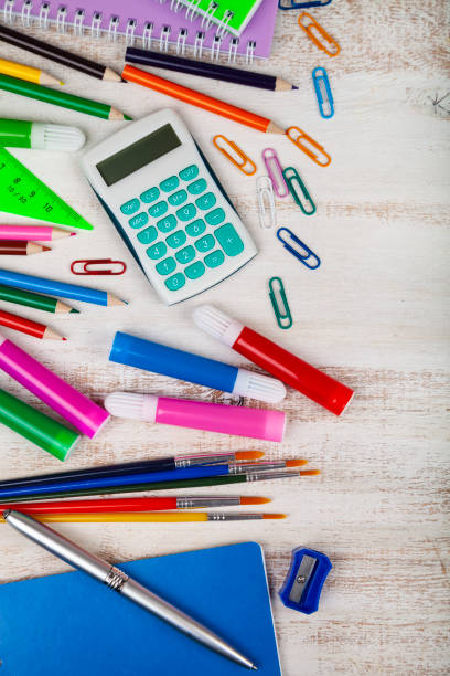 istock Items for the school on a wooden table. 1173172897