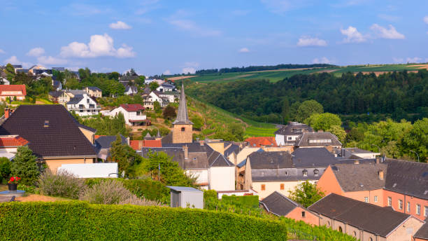 The village of Ehnen, Luxembourg, along the Mosel river surrounded by vineyards