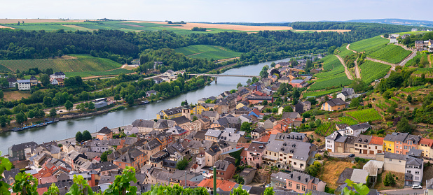 The village of Wormeldange, Luxembourg, along the Mosel river surrounded by vineyards
