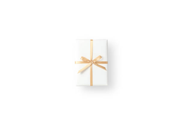 top view of white gift box with gold ribbon on white isolated background - gift gold box white imagens e fotografias de stock