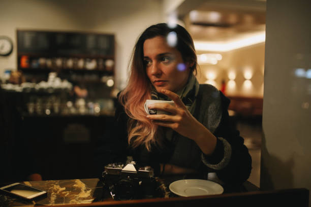 istock Young woman in a Berlin cafe 1173191053
