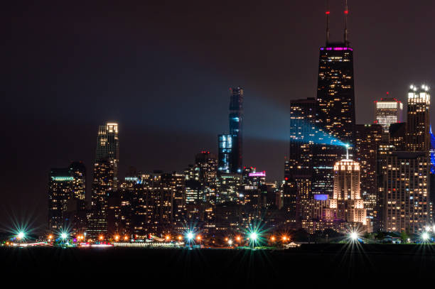 istock Downtown lights up at night. Chicago skyline from the north lakefront. 1173197678