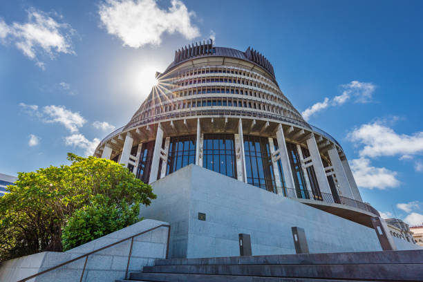 The Beehive Wellington Sun Stars New Zealand The Beehive, New Zealand's Parliament Building, against the Sun. Wellington, North Island, New Zealand, Oceania beehive new zealand stock pictures, royalty-free photos & images