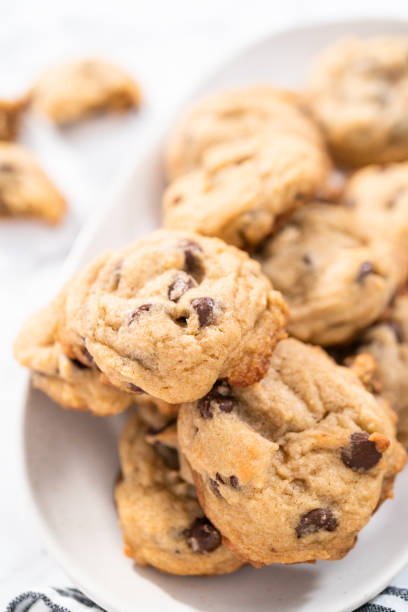 istock Homemade chocolate chips cookies on a white plate. 1173205420
