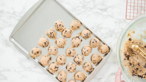istock Scooping homemade chocolate chip cookies 1173205732