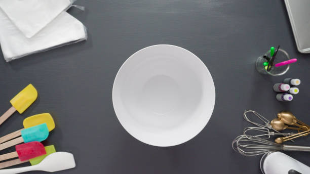 istock Preparing simple royal icing to decorate sugar cookies. 1173206602