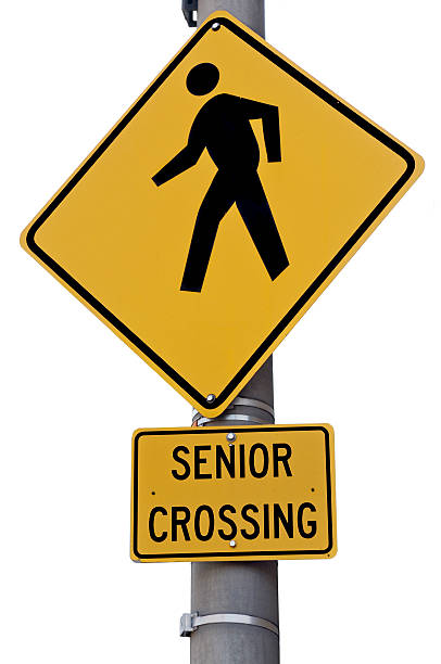 istock Senior Crossing Street Sign 117320930