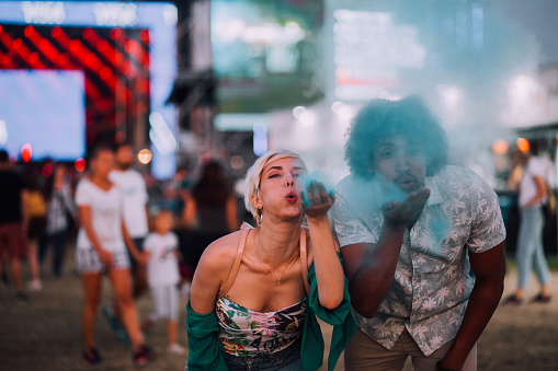 Couple blowing powder color