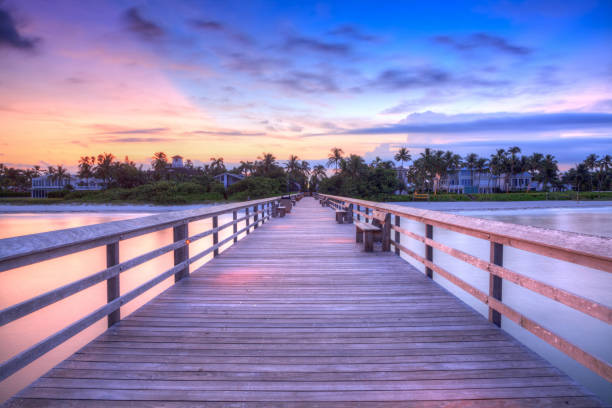 istock Sunrise over Naples Pier where people fish at dawn in Naples 1173214801