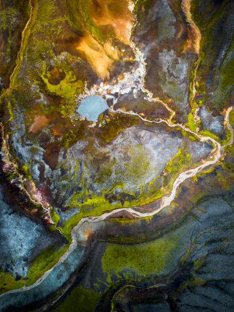 Abstract volcanic landspace in the highlands of Iceland. Fjallabak is Nature Reserve area in the highlands of Iceland. It has volcanic activity and the vivid colors are due to the rhyolite and obsidian making the ground appear blue, green, red, pink and yellow. lava photos stock pictures, royalty-free photos & images