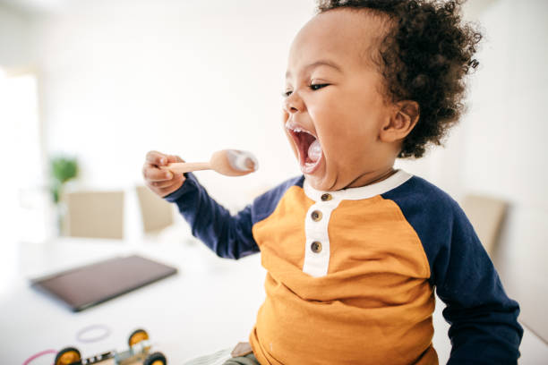 istock Toddler eating yogurt 1173222606