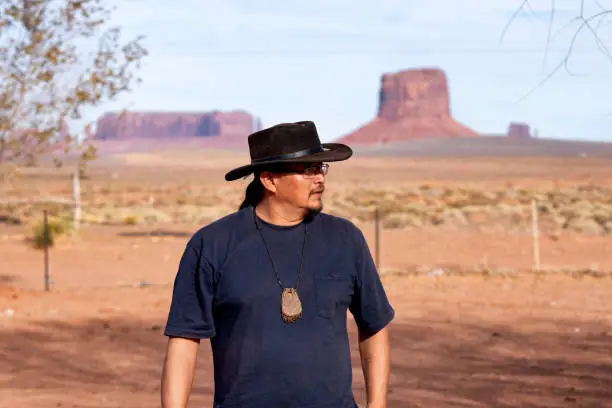 Young Adult Native American Navajo Man In His Home in Monument Valley Arizona