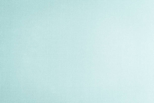 istock Cotton silk blended fabric wall paper texture pattern background in pastel white pale green cyan turquoise blue color 1173222722