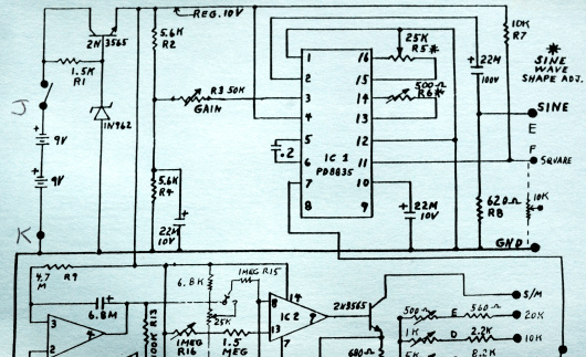 A hand-drawn schematic of an electronic device printed on light-blue paper.