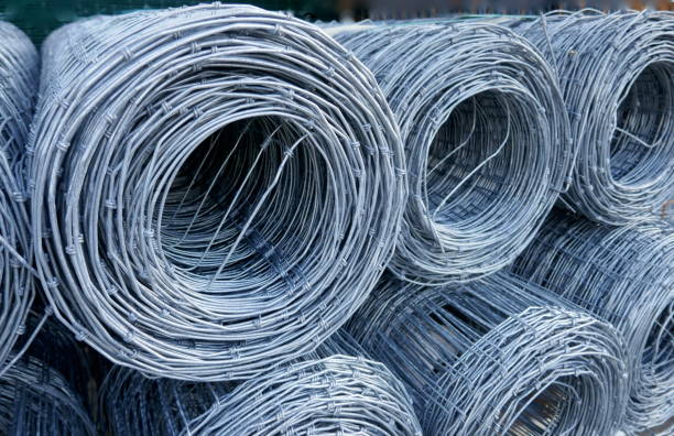 istock Wire mesh fence, rolled up. Close up, texture, background, 1173224201