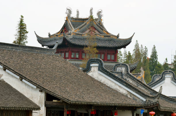 istock Old village by river in Shanghai with boat 1173230113