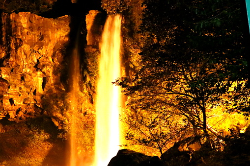 It is the night view of Cheonjiyeon Falls in Jeju.