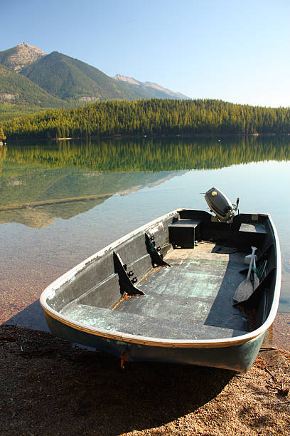istock Fishing Boat on Shore of Lake 117323770