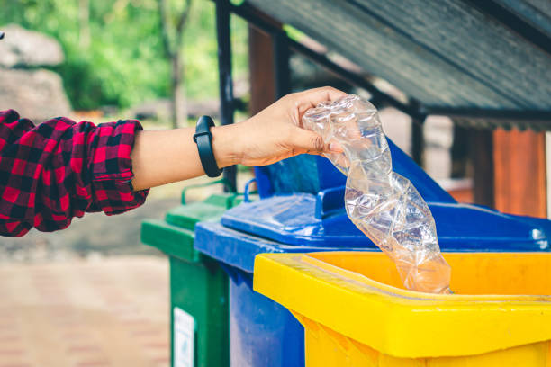 istock Women volunteer help garbage collection for to recycling environment. 1173242920