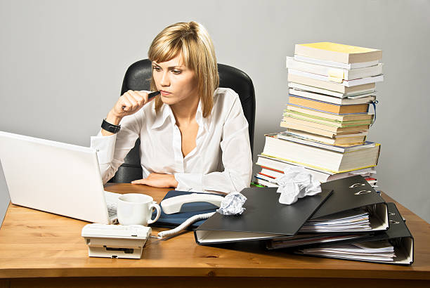istock Thoughtful Business Lady at Desk 117325136