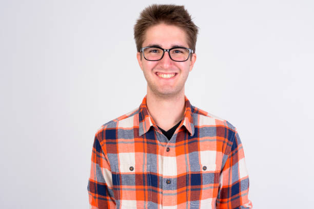 istock Face of happy young handsome man with eyeglasses smiling 1173252772