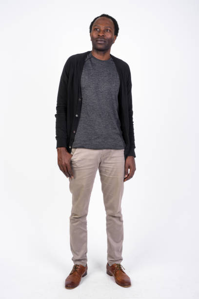 istock Full body shot of handsome African man thinking 1173255454
