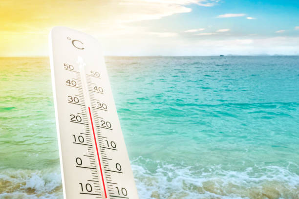 Heat wave on the beach thermometer shows in summer. stock photo