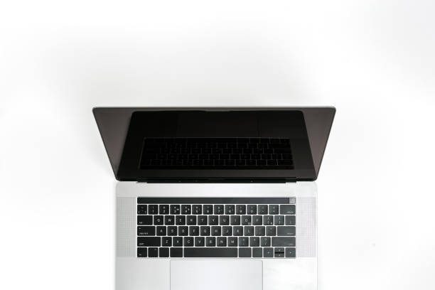 istock Open laptop with blank screen on a white background top view 1173258987