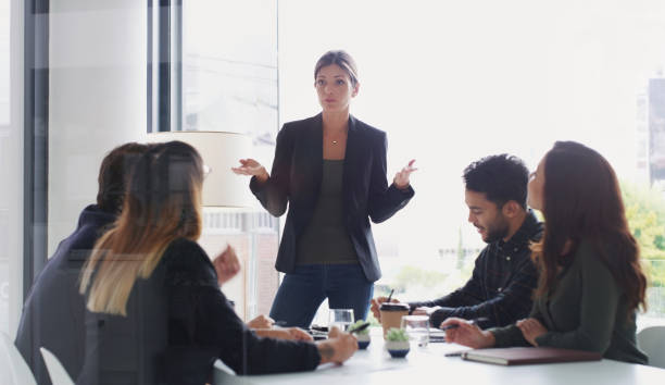 istock Updating her team on the company's progress 1173260000