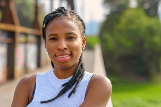 istock Thoughtful young African woman with a quiet smile 1173261439