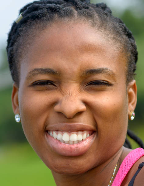 istock Pretty young African woman with a friendly smile 1173261625