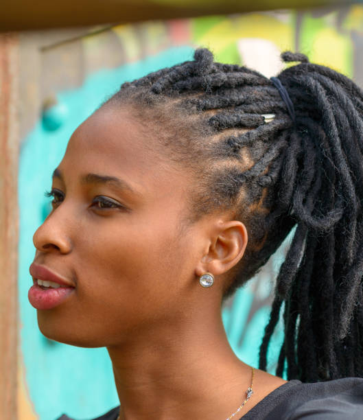 istock Trendy attractive African student wearing braids 1173262591