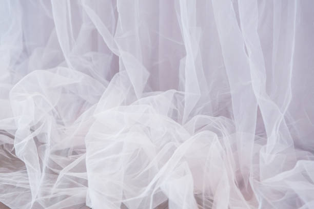 istock Pink transparent fabric organza or mesh, drape vertically. Abstract background 1173262767