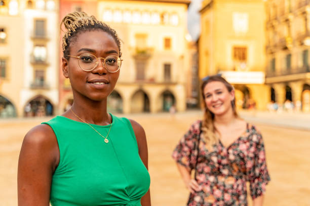 Two girls in Vic old town, plaça Major stock photo