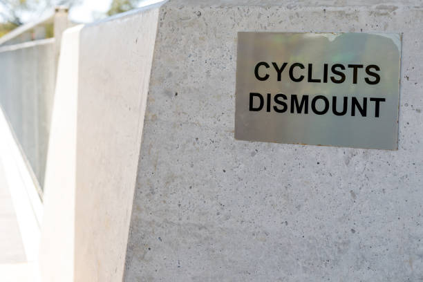 istock Cyclist Dismount Sign 1173266396