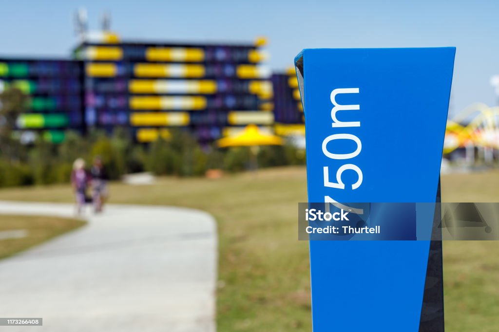 Distance Marker In Urban Parkland Australia Stock Photo Distance Marker In Urban Parkland Australia Stock Photo