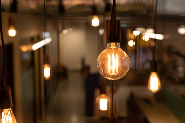 Funky Lighting Funky Lighting In Modern Office light bulb filament photos stock pictures, royalty-free photos & images