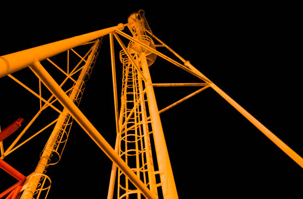 Ladder on a lightning rod against the night sky