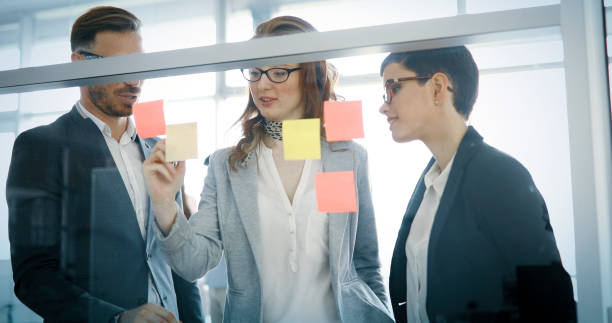 istock Corporate teamworking colleagues in modern office 1173272563