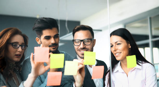 istock Group of business people collaborating in office 1173272654