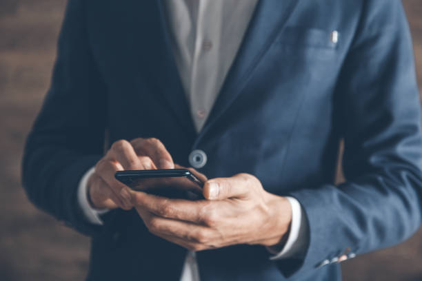istock young man hand smart phone 1173275510
