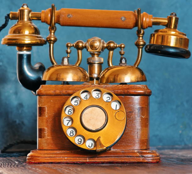 istock vintage vintage disc phone on background 1173277154