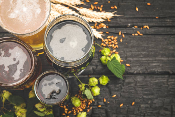istock Bottle and Glass beer with Brewing ingredients 1173282701
