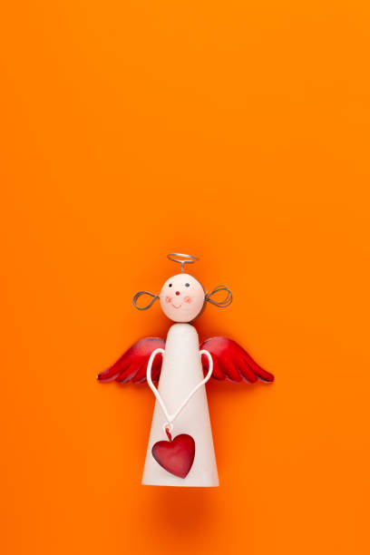 istock Christmas decor. Christmas decorations on orange background. Flat lay, top view, copy space. 1173283052